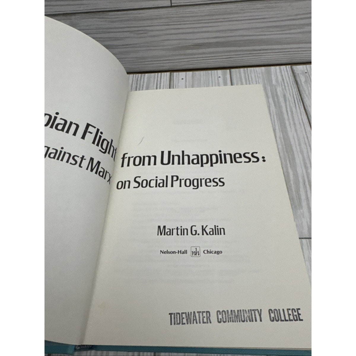 The Utopian Flight from Unhappiness : Freud Against Marx on Socia