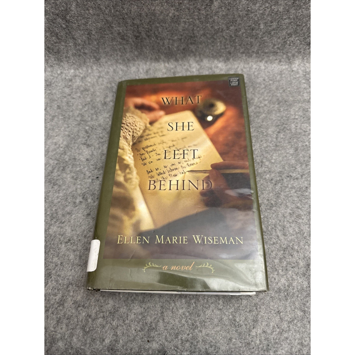 What She Left Behind by Ellen Marie Wiseman (2014, Library Binding)