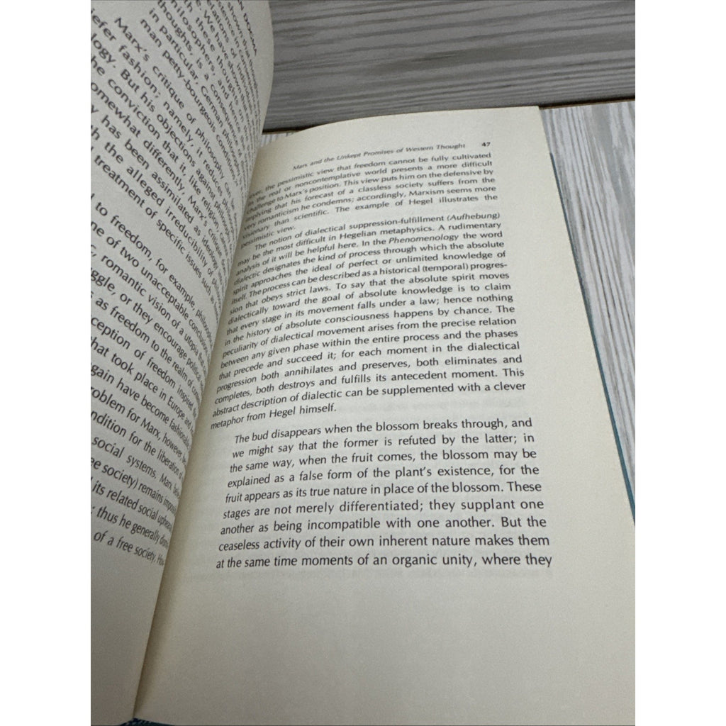 The Utopian Flight from Unhappiness : Freud Against Marx on Socia